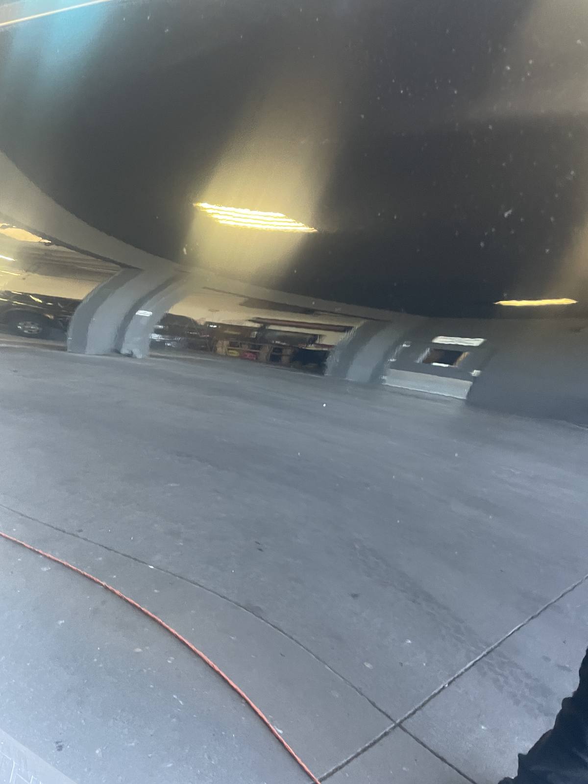After: Keyed scratch cluster, black sedan