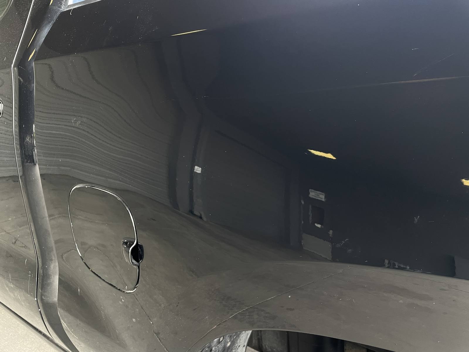 After: Arcing scuffs and transfer, black truck